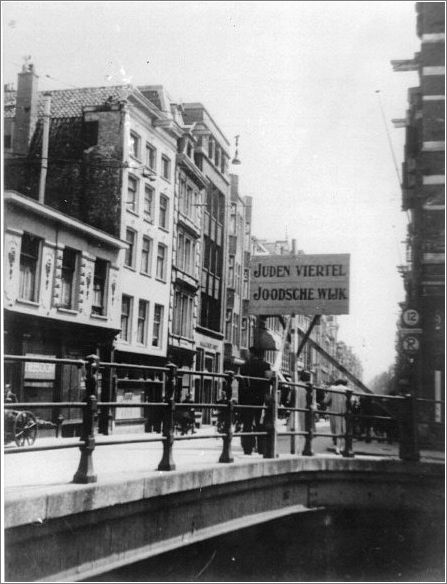 Sign posted over bridge leading to the Jewish Quarte in Amsterdam